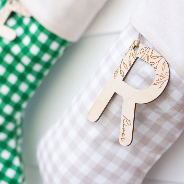 Closeup of letter 'R' wooden name plaque