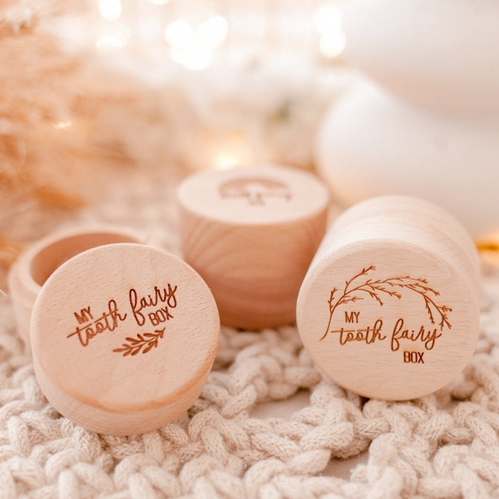 Set of three wooden tooth fairy trinket boxes.
