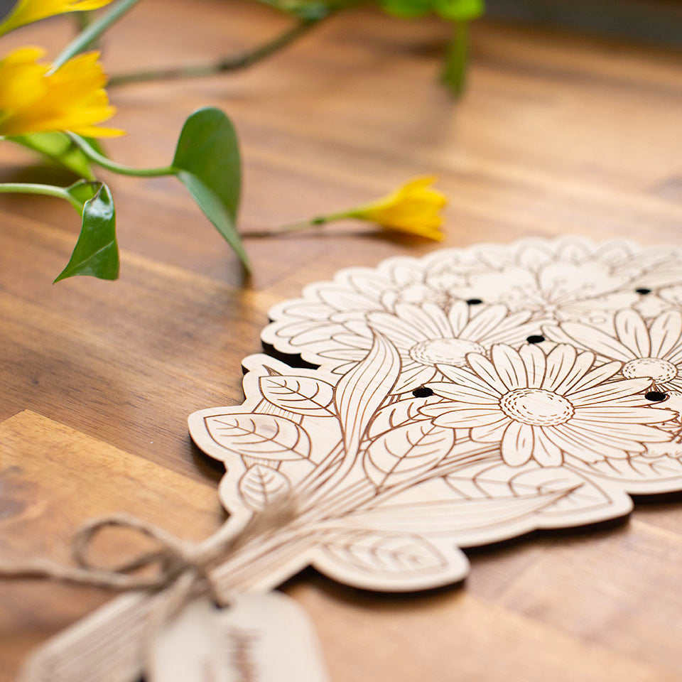 Closeup of Hello Fern Mother's Day wooden flower bouquet.