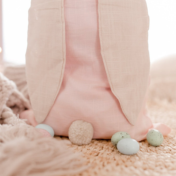 Hello Fern pink Easter Sack showing bunny ears and tail with Easter eggs.