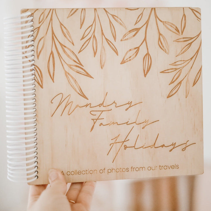 Front view of Hello Fern wooden photo album showing custom etched cover for family holidays photo collection.