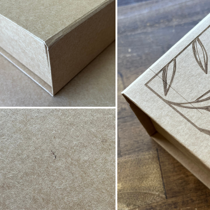 Examples of flaws on flawed custom kraft keepsake boxes including dents, chips, dark spots, lines, scratches, and more.