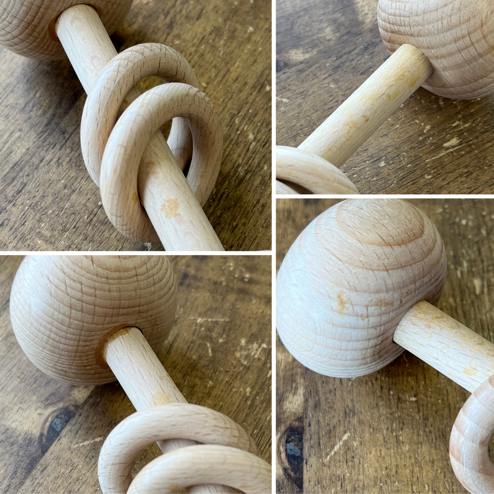 Examples of flaws on flawed custom wooden baby rattles including glue marks, chips, dents, discoloured spots, and more.