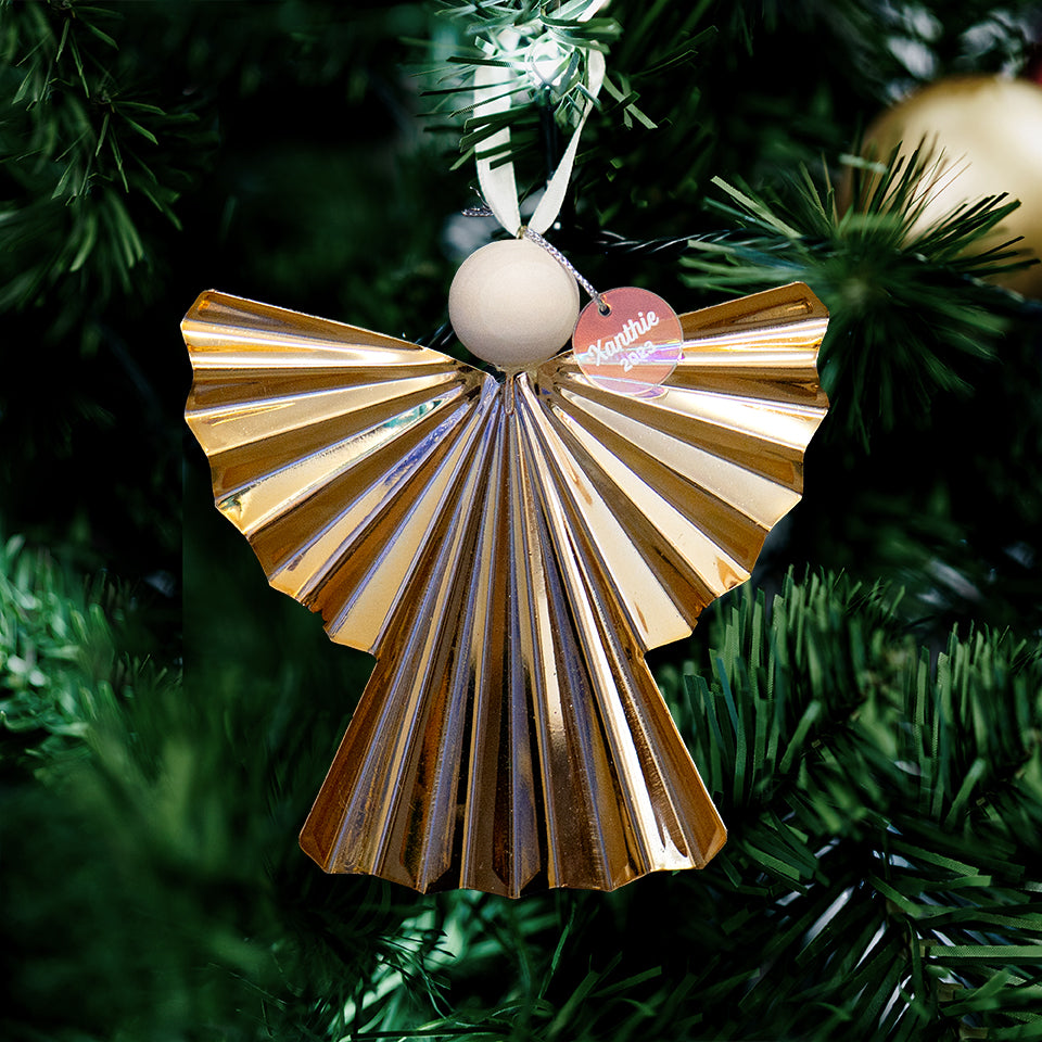 Christmas tree with closeup of angel ornament displaying Hello Fern personalised iridescent clear acyrlic ornament tag.