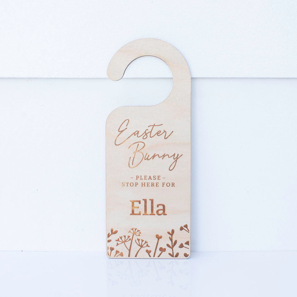 Hello Fern Easter Bunny please stop here wooden door hanger featuring the name 'Ella' isolated on white background.