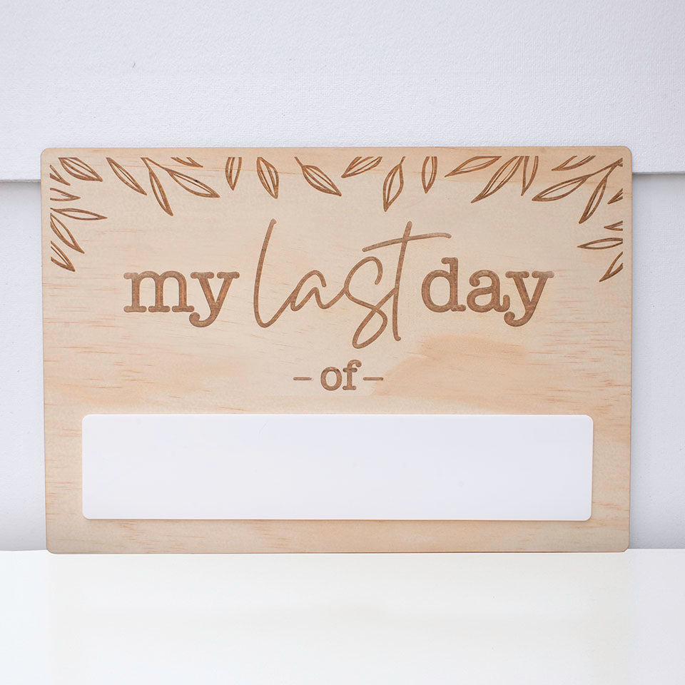 Double-sided wooden back-to-school board showing "my last day of" side including acrylic space to write.