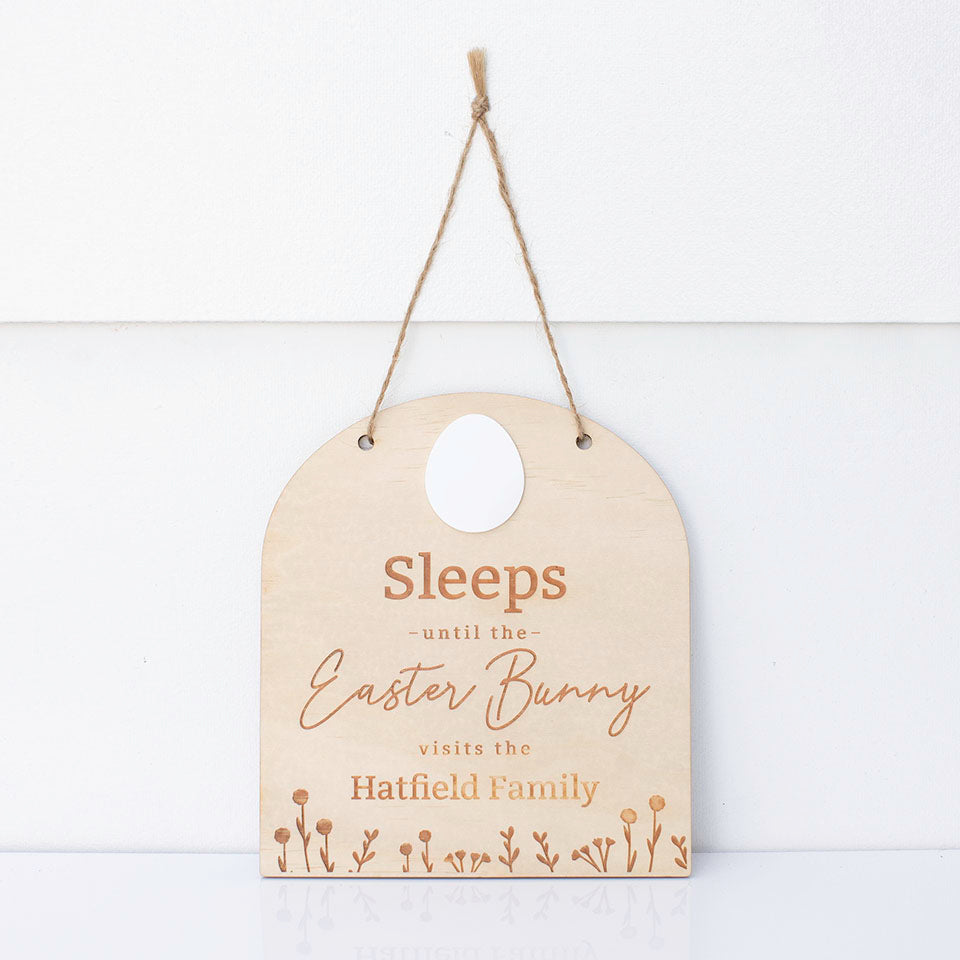 Hello Fern custom Easter countdown sign isolated on white wall with twine for hanging.