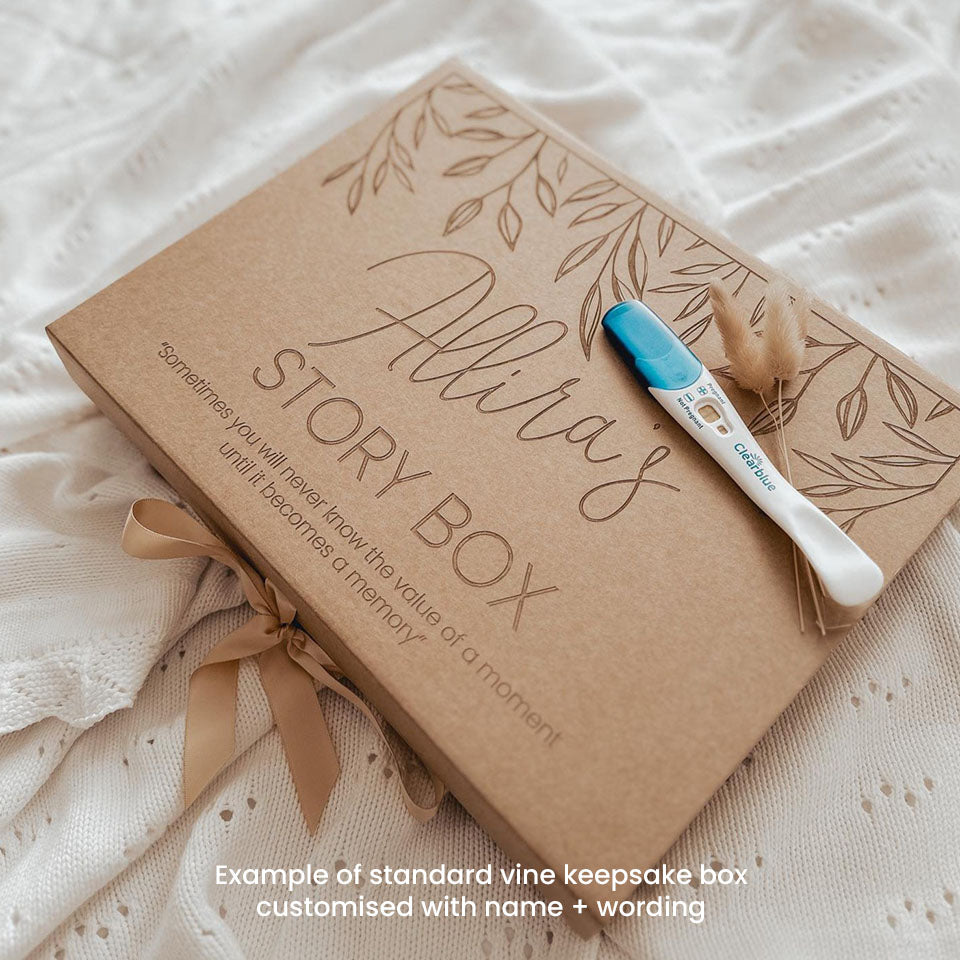 Closeup view example of optional extra standard vine kraft keepsake box, which can be customised with baby's name and can store Hello Fern's wooden baby memory book.