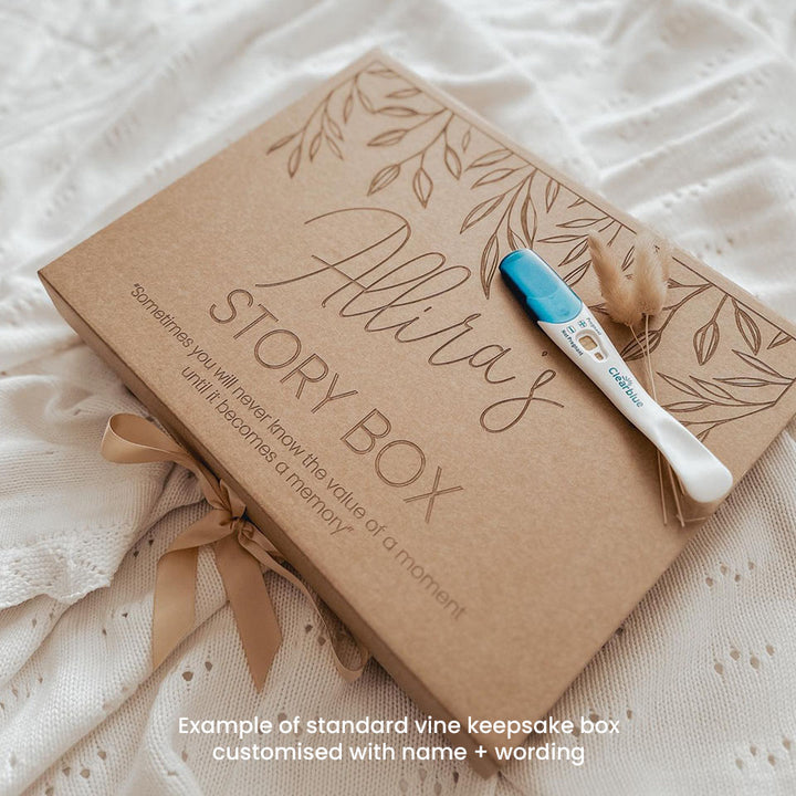 Closeup view example of optional extra standard vine kraft keepsake box, which can be customised with baby's name and can store Hello Fern's wooden baby memory book.