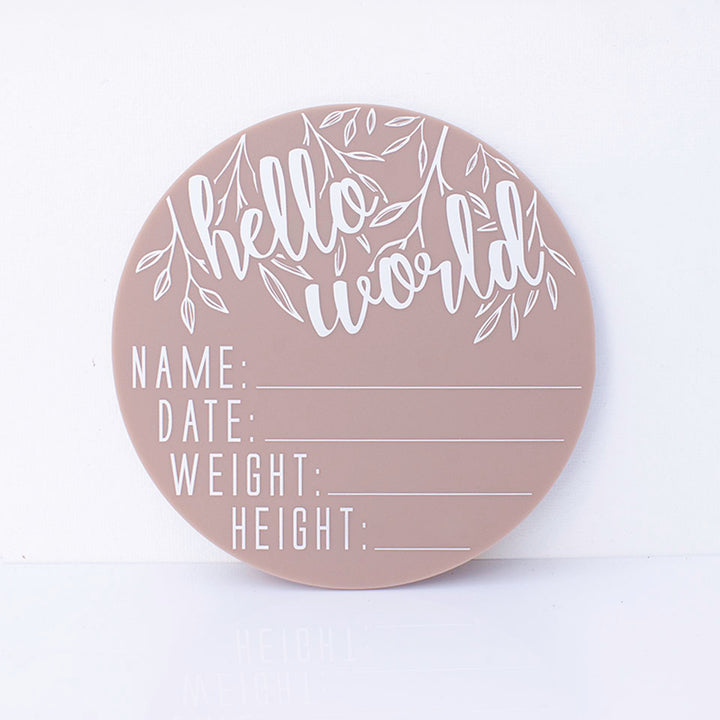Hello Fern latte acrylic 'Hello Word' plaque with spaces for baby's name, birth date, weight, and height isolated on white background.