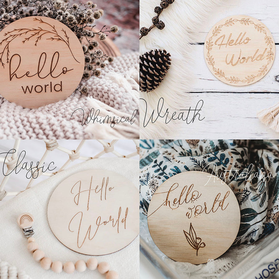 Four Hello World wooden baby announcement round disc designs including whimsical, wreath, classic, and Australiana.