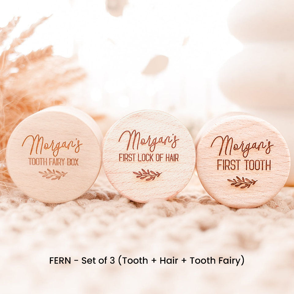 Set of three of Hello Fern wooden trinket boxes including baby's first tooth, first lock of hair, and tooth fairy. All three boxes are customised with a laser-engraved name.
