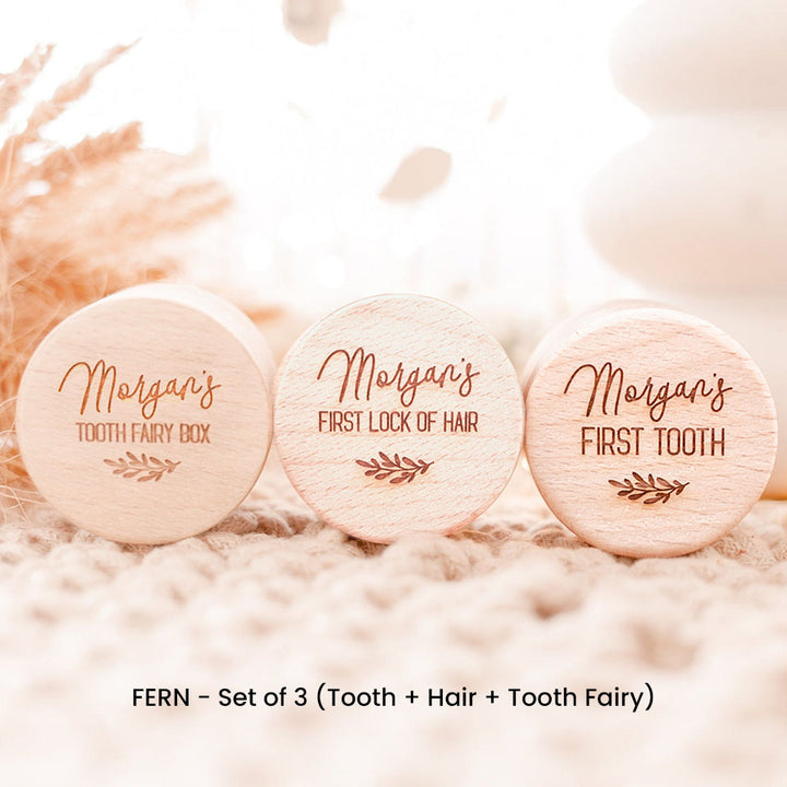 Set of three of Hello Fern wooden trinket boxes including baby's first tooth, first lock of hair, and tooth fairy. All three boxes are customised with a laser-engraved name.