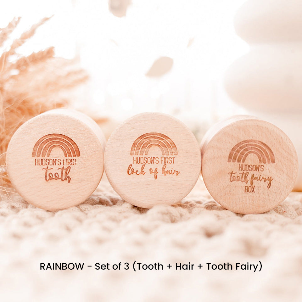 Set of three Hello Fern wooden trinket boxes in rainbow style, including baby's first tooth, first lock of hair, and tooth fairy, all custom laser-engraved with child's name.