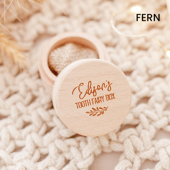 Closeup of Hello Fern tooth fairy wooden trinket box laser engraved with child's name shown with lid open.