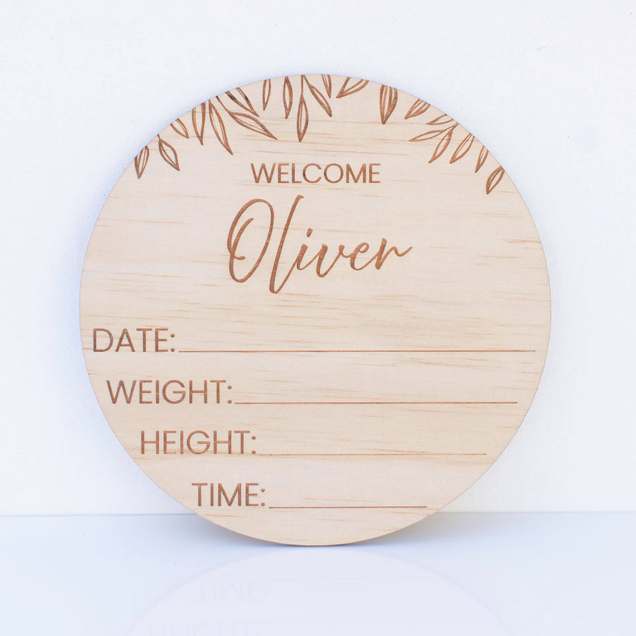 Hello Fern welcome birth announcement disc customised with baby's first name against white background.