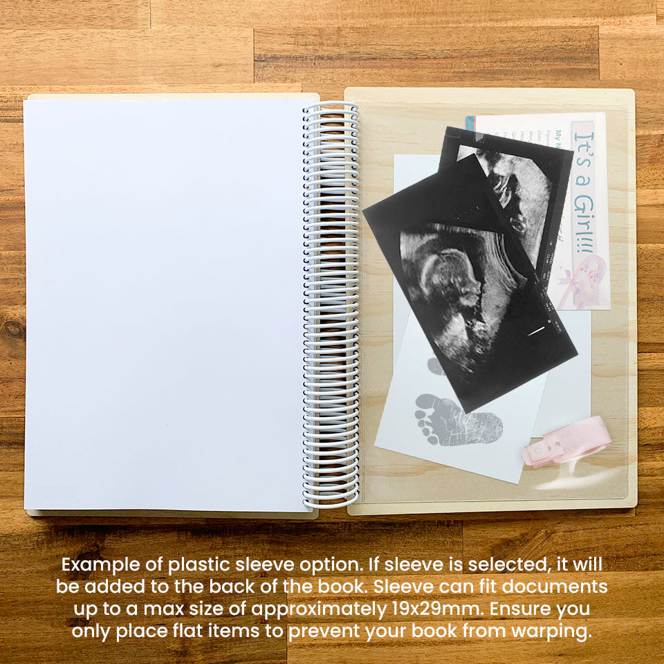 Example of plastic sleeve optional extra added to the back of a Hello Fern wooden baby memory book which includes birth keepsake items.