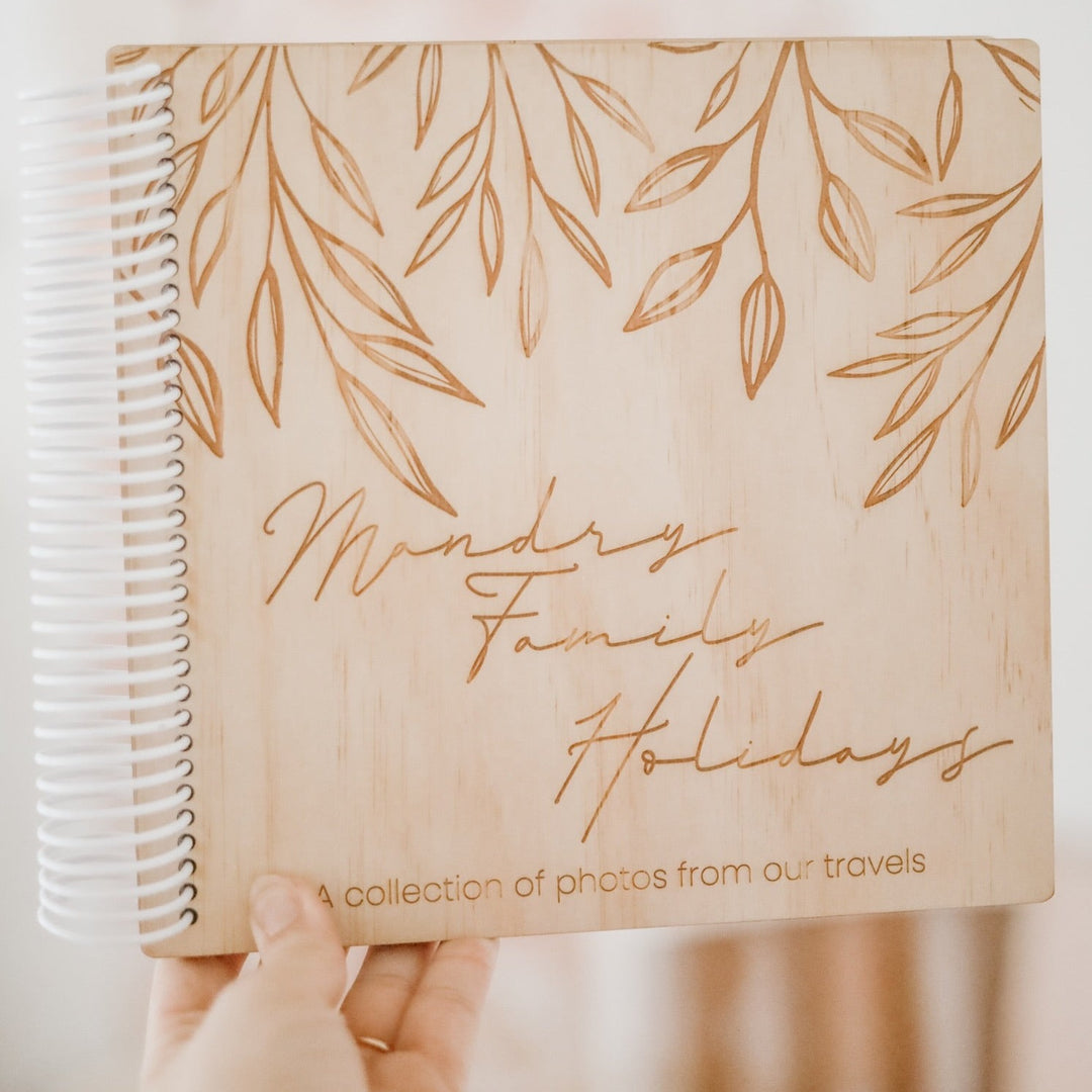 Front view of Hello Fern wooden photo album showing custom etched cover for family holidays photo collection.